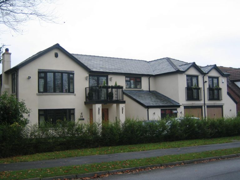 Front view of a completed large house extension, showcasing expert planning and architectural design